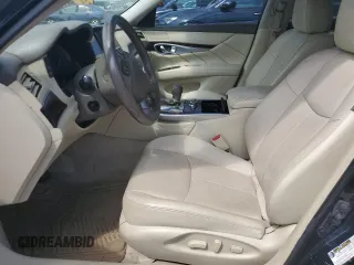 2017 Infiniti Q70 3.7 z VIN JN1BY1PR3HM210529, wystawiony jako Copart lot #68966204 z przebiegiem Nie podano mil oraz Nie do naprawy. Historia ofert i sprzedaży dostępna na DreamBid. Obrazek 7.