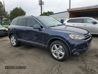2011 Volkswagen Touareg Lux z VIN WVGFK9BP4BD001551, wystawiony jako Copart lot #58743065 z przebiegiem 142 661 mil mil oraz Szkoda całkowita • Salvage title. Historia ofert i sprzedaży dostępna na DreamBid. Obrazek 4.