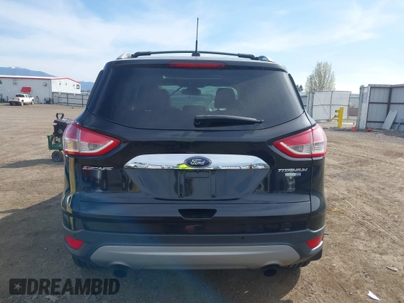 2014 Ford Escape Titanium with VIN 1FMCU9J93EUE27803, listed as a IAAI auction lot 42028249 with 131,194 mi miles and . Bid and sale history available at DreamBid. Image 15.