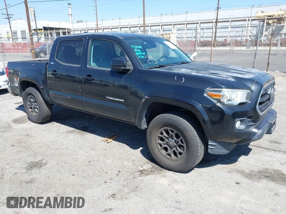 2018 Toyota Tacoma SR5 with VIN 3TMAZ5CN1JM061127, listed as a IAAI auction lot 42012247 with 119,381 mi miles and . Bid and sale history available at DreamBid. Image 1.