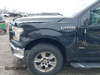 2015 Ford F-150 XLT with VIN 1FTEW1EPXFFC20641, listed as a IAAI auction lot 41945749 with 120,229 mi miles and . Bid and sale history available at DreamBid. Image 18.
