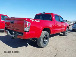 2021 Toyota Tacoma 4WD SR5 with VIN 3TMDZ5BN3MM102098, listed as a IAAI auction lot 41381650 with 30,642 mi miles. Bid and sale history available at carsss.com. Image 4.