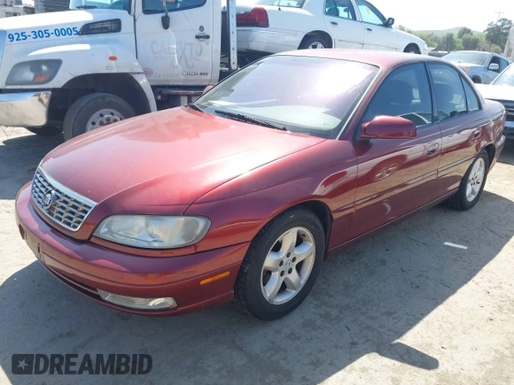 2001 Cadillac Catera z VIN W06VR54R01R003061, wystawiony jako IAAI lot #41989882 z przebiegiem 77 248 mil mil oraz . Historia ofert i sprzedaży dostępna na DreamBid. Obrazek 2.