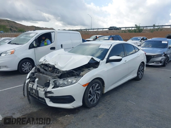 2018 Honda Civic EX with VIN 19XFC2F76JE206191, listed as a IAAI auction lot 41949231 with 146,118 mi miles and . Bid and sale history available at DreamBid. Image 17.