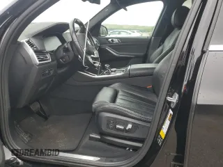2020 BMW X5 xDrive40i with VIN 5UXCR6C09L9C95232, listed as a Copart auction lot 60697765 with 30,017 mi miles and Salvage title. Bid and sale history available at DreamBid. Image 7.