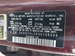 2016 Kia Optima LX with VIN 5XXGT4L36GG108599, listed as a IAAI auction lot 42065639 with 127,387 mi miles. Bid and sale history available at carsss.com. Image 9.