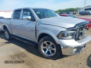 2016 Ram 1500 Laramie z VIN 1C6RR7NT1GS121456, wystawiony jako IAAI lot #42107101 z przebiegiem 142 825 mil mil oraz . Historia ofert i sprzedaży dostępna na DreamBid. Obrazek 1.