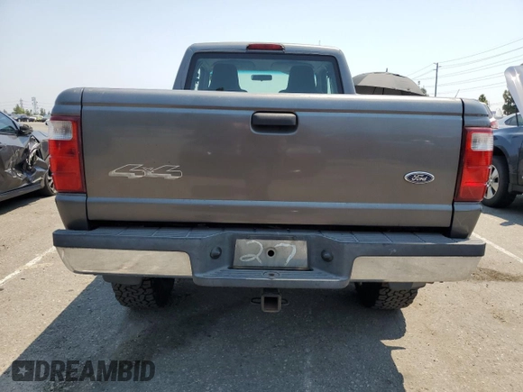2005 Ford Ranger XL with VIN 1FTZR15E45PA73118, listed as a Copart auction lot 64683135 with 162,514 mi miles and Salvage title. Bid and sale history available at DreamBid. Image 6.