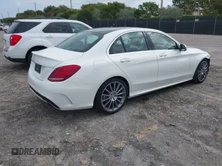 2016 Mercedes-Benz C 300 with VIN 55SWF4JB5GU131922, listed as a IAAI auction lot 42014152 with 52,041 mi miles and . Bid and sale history available at carsss.com. Image 4.