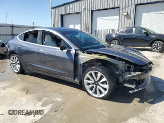 2020 Tesla Model 3 Long Range with VIN 5YJ3E1EBXLF668795, listed as a Copart auction lot 49913515 with 82,962 mi miles and Salvage Title. Bid and sale history available at DreamBid. Image 4.