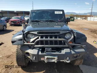 2013 Jeep Wrangler Unlimited Rubicon с VIN 1C4HJWFGXDL681294, выставлен на аукционе Copart как лот 58189305 с пробегом 148 414 миль миль и Списание • Salvage title. История ставок и продаж доступна на DreamBid. Изображение 5.