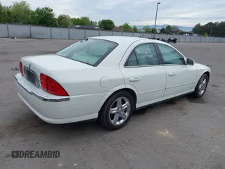 2002 Lincoln LS w/Base Pkg with VIN 1LNHM87A12Y643476, listed as a IAAI auction lot 42131765 with 205,900 mi miles. Bid and sale history available at carsss.com. Image 4.