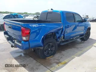 2018 Toyota Tacoma SR5 z VIN 5TFAZ5CN2JX064452, wystawiony jako IAAI lot #41945468 z przebiegiem 132 450 mil mil oraz . Historia ofert i sprzedaży dostępna na DreamBid. Obrazek 4.