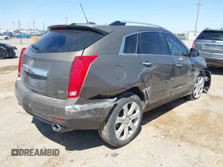 2015 Cadillac SRX Premium Collection with VIN 3GYFNDE32FS569269, listed as a IAAI auction lot 41988807 with 56,481 mi miles. Bid and sale history available at carsss.com. Image 4.