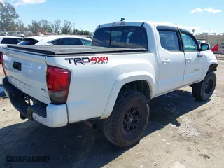 2019 Toyota Tacoma 4WD SR with VIN 3TMCZ5AN3KM207007, listed as a IAAI auction lot 41755529 with 43,203 mi miles. Bid and sale history available at carsss.com. Image 4.