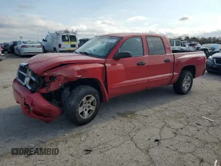 2005 Dodge Dakota SLT z VIN 1D7HW48K05S310312, wystawiony jako Copart lot #88061125 z przebiegiem 208 806 mil mil oraz Nie do naprawy • Non repairable. Historia ofert i sprzedaży dostępna na DreamBid. Obrazek 1.