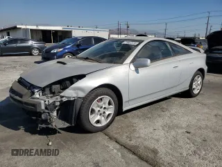 2003 Toyota Celica GT with VIN JTDDR32T130164099, listed as a Copart auction lot 77907374 with 73,950 mi miles and Salvage Title. Bid and sale history available at carsss.com. Image 1.