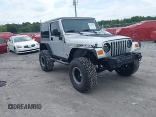 2006 Jeep Wrangler Rubicon with VIN 1J4FA69S16P723008, listed as a IAAI auction lot 42632982 with 128,512 mi miles and . Bid and sale history available at DreamBid. Image 1.