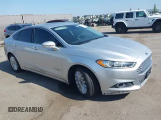 2016 Ford Fusion SE Hybrid with VIN 3FA6P0LU8GR203934, listed as a IAAI auction lot 42595741 with 84,189 mi miles and . Bid and sale history available at DreamBid. Image 1.
