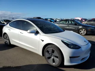 2023 Tesla Model 3 with VIN 5YJ3E1EA6PF500889, listed as a Copart auction lot 41895865 with 15,199 mi miles and Salvage Title. Bid and sale history available at carsss.com. Image 4.