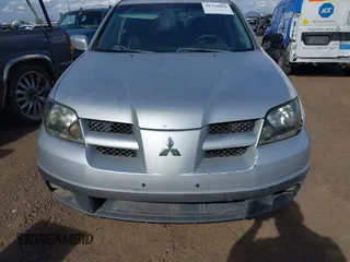 2003 Mitsubishi Outlander XLS with VIN JA4LX41G73U044032, listed as a IAAI auction lot 41794058 with 285,734 mi miles. Bid and sale history available at carsss.com. Image 6.