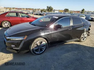 2018 Honda Clarity Plug-In Hybrid Touring with VIN JHMZC5F3XJC006917, listed as a Copart auction lot 76447164 with 68,889 mi miles and Salvage Title. Bid and sale history available at carsss.com. Image 1.