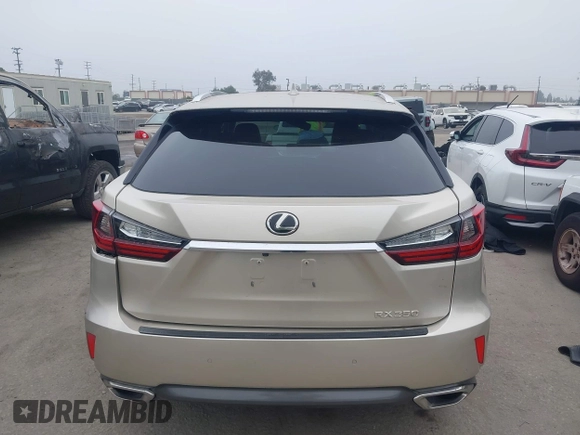 2016 Lexus RX 350 z VIN 2T2ZZMCA7GC026468, wystawiony jako IAAI lot #42433640 z przebiegiem 91 376 mil mil oraz . Historia ofert i sprzedaży dostępna na DreamBid. Obrazek 17.