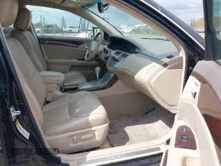2009 Toyota Avalon XL with VIN 4T1BK36B79U327316, listed as a IAAI auction lot 42130918 with 184,948 mi miles. Bid and sale history available at carsss.com. Image 5.