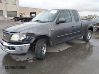 2003 Ford F-150 XL with VIN 1FTRX17W03NB51687, listed as a IAAI auction lot 41712022 with 183,428 mi miles. Bid and sale history available at carsss.com. Image 17.