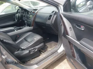 2011 Mazda CX-9 Grand Touring with VIN JM3TB3DV2B0332191, listed as a IAAI auction lot 42211435 with 155,801 mi miles and . Bid and sale history available at DreamBid. Image 5.