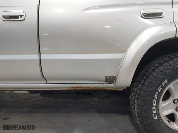 2000 Toyota 4Runner SR5 with VIN JT3HN86R6Y0307665, listed as a IAAI auction lot 42039007 with 162,449 mi miles. Bid and sale history available at carsss.com. Image 6.