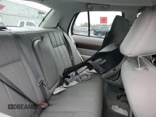 2003 Mercury Grand Marquis LS Premium with VIN 2MEFM75W13X667779, listed as a Copart auction lot 52869985 with 127,506 mi miles and Salvage Title. Bid and sale history available at DreamBid. Image 10.