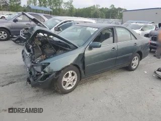 2004 Toyota Camry LE z VIN 4T1BE32K84U294381, wystawiony jako Copart lot #52678215 z przebiegiem 122 342 mil mil oraz Szkoda całkowita • Salvage title. Historia ofert i sprzedaży dostępna na DreamBid. Obrazek 1.