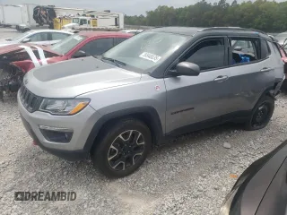 2020 Jeep Compass Trailhawk with VIN 3C4NJDDB6LT195731, listed as a Copart auction lot 50948035 with 80,195 mi miles and Salvage title. Bid and sale history available at DreamBid. Image 1.