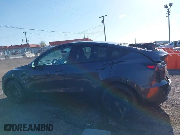2021 Tesla Model Y Long Range with VIN 5YJYGAEE1MF149887, listed as a IAAI auction lot 42032104 with 54,932 mi miles. Bid and sale history available at carsss.com. Image 14.