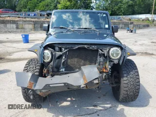 2007 Jeep Wrangler X with VIN 1J4FA24117L170294, listed as a Copart auction lot 64806715 with 132,130 mi miles and Salvage title. Bid and sale history available at DreamBid. Image 5.