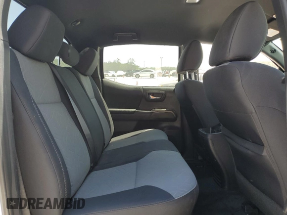 2023 Toyota Tacoma SR5 z VIN 3TMAZ5CN2PM217085, wystawiony jako Copart lot #53563675 z przebiegiem 7 389 mil mil oraz Szkoda całkowita • Salvage title. Historia ofert i sprzedaży dostępna na DreamBid. Obrazek 10.