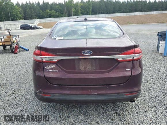 2017 Ford Fusion SE с VIN 3FA6P0H79HR392131, выставлен на аукционе Copart как лот 56063695 с пробегом 151 820 миль миль и Списание • Salvage title. История ставок и продаж доступна на DreamBid. Изображение 6.