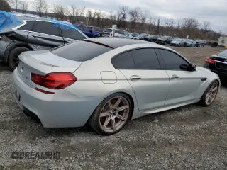 2014 BMW M6 z VIN WBS6C9C5XED467254, wystawiony jako Copart lot #50335275 z przebiegiem 67 534 mil mil oraz Szkoda całkowita • Salvage title. Historia ofert i sprzedaży dostępna na DreamBid. Obrazek 3.