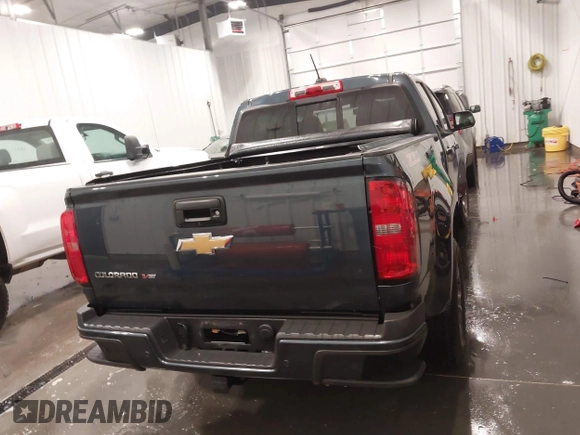 2020 Chevrolet Colorado 4WD Z71 with VIN 1GCGTDEN1L1163546, listed as a IAAI auction lot 41706719 with 64,662 mi miles and . Bid and sale history available at DreamBid. Image 16.