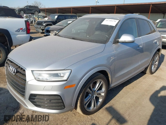 2016 Audi Q3 Prestige with VIN WA1GFCFS4GR008058, listed as a IAAI auction lot 41749276 with 105,692 mi miles. Bid and sale history available at carsss.com. Image 2.