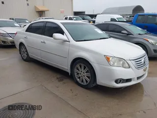2010 Toyota Avalon XL with VIN 4T1BK3DB3AU356836, listed as a IAAI auction lot 41832249 with 208,547 mi miles and . Bid and sale history available at carsss.com. Image 1.
