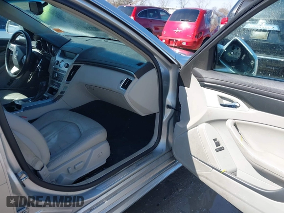 2013 Cadillac CTS Luxury z VIN 1G6DG5E56D0112860, wystawiony jako IAAI lot #41970874 z przebiegiem 125 647 mil mil oraz . Historia ofert i sprzedaży dostępna na DreamBid. Obrazek 5.