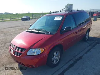 2005 Dodge Caravan SXT with VIN 2D4GP44L05R552278, listed as a IAAI auction lot 42582873 with 131,887 mi miles and . Bid and sale history available at DreamBid. Image 2.