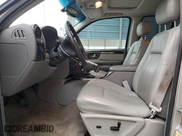 2006 GMC Envoy SLT with VIN 1GKDS13S062186025, listed as a Copart auction lot 79041904 with 220,053 mi miles and Salvage Title. Bid and sale history available at carsss.com. Image 7.