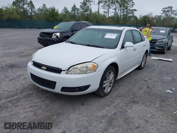 2013 Chevrolet Impala LTZ with VIN 2G1WC5E39D1202260, listed as a IAAI auction lot 41908155 with 210,193 mi miles and . Bid and sale history available at DreamBid. Image 17.