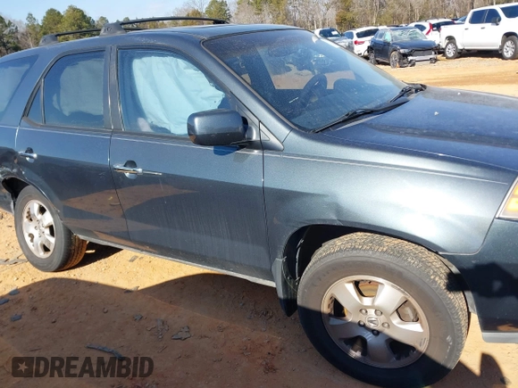2005 Acura MDX with VIN 2HNYD18205H531571, listed as a IAAI auction lot 41405975 with 127,354 mi miles. Bid and sale history available at carsss.com. Image 12.