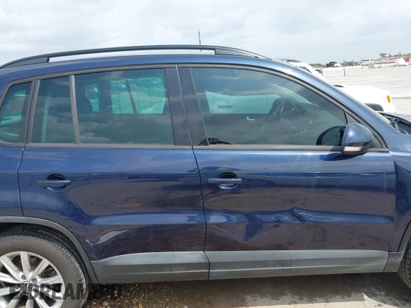 2015 Volkswagen Tiguan SE with VIN WVGAV7AX1FW508313, listed as a IAAI auction lot 42120704 with 136,405 mi miles and . Bid and sale history available at DreamBid. Image 13.