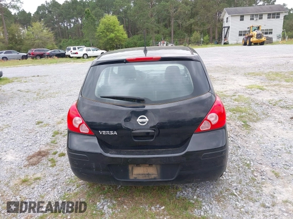 2009 Nissan Versa SL z VIN 3N1BC13E49L488417, wystawiony jako IAAI lot #41943795 z przebiegiem 221 010 mil mil oraz . Historia ofert i sprzedaży dostępna na DreamBid. Obrazek 16.