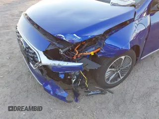 2021 Hyundai Ioniq SE with VIN KMHC65LD8MU252578, listed as a IAAI auction lot 40965612 with 25,384 mi miles and . Bid and sale history available at DreamBid. Image 6.
